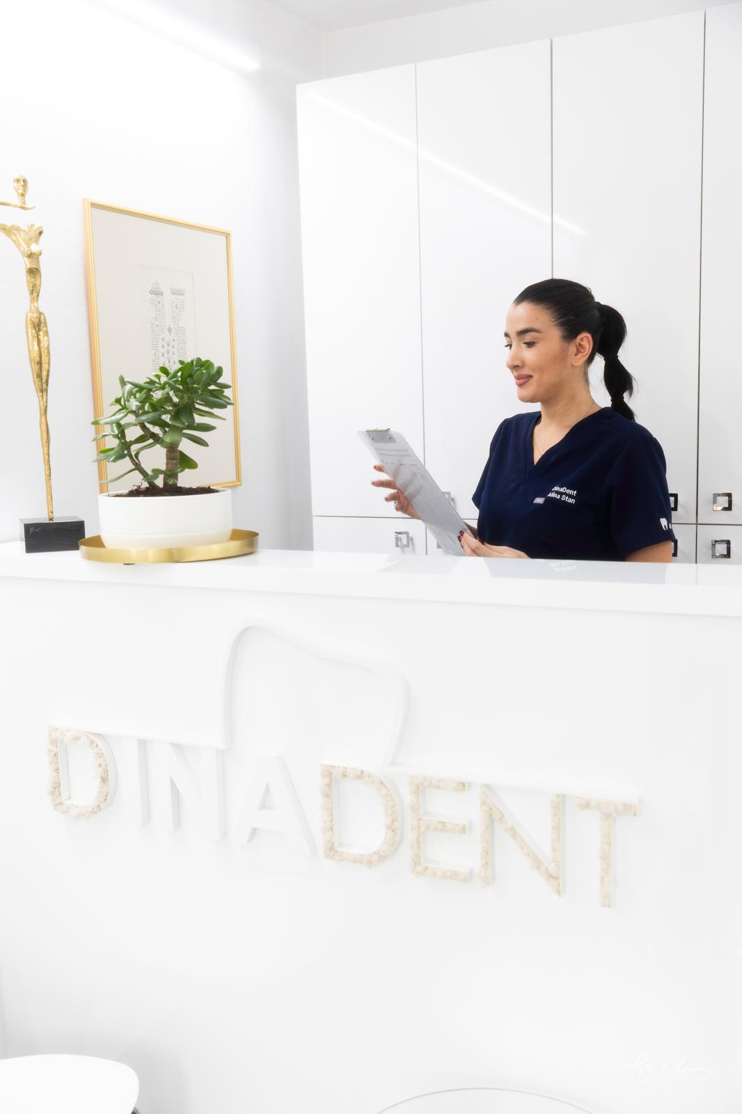 Smiling dentist with a patient